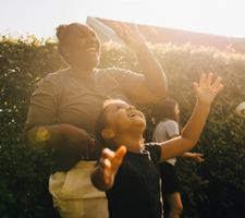 Mom and children playing