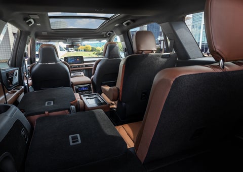 The interior of the 2025 Lincoln Aviator® SUV is shown with two seats folded down for added space. | Bill Collins Lincoln of Louisville in Louisville KY