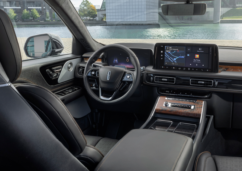 The interior of the 2025 Lincoln Aviator® SUV is shown parked with a view of a harbor through the windshield. | Bill Collins Lincoln of Louisville in Louisville KY