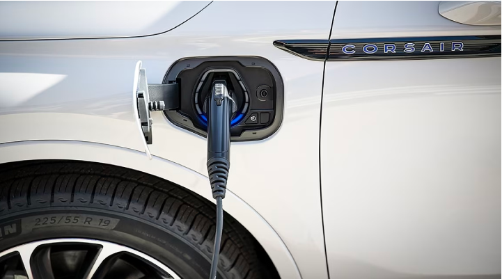 An electric charger is shown plugged into the charging port of a Lincoln Corsair® Grand Touring
model. | Bill Collins Lincoln of Louisville in Louisville KY