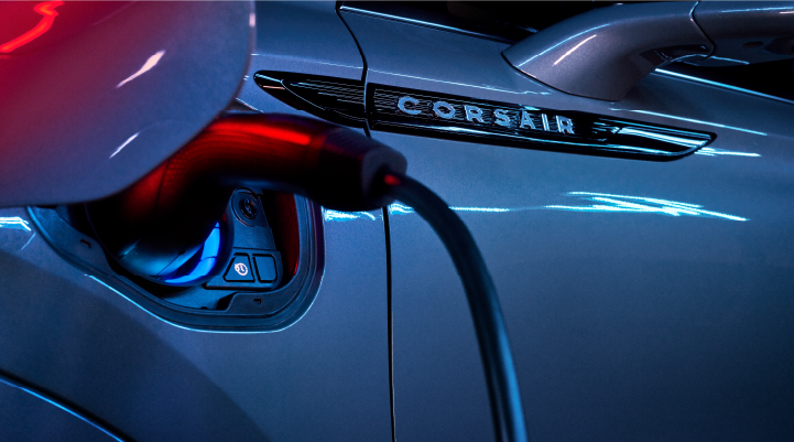 A charger plugged into the charging port of a 2025 Lincoln Corsair® Plug-in Hybrid model. | Bill Collins Lincoln of Louisville in Louisville KY