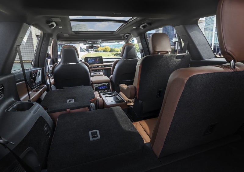 One side of the PowerFold® third-row seat and a second-row seat are folded forward in the 2026 Lincoln Aviator® SUV. | Bill Collins Lincoln of Louisville in Louisville KY