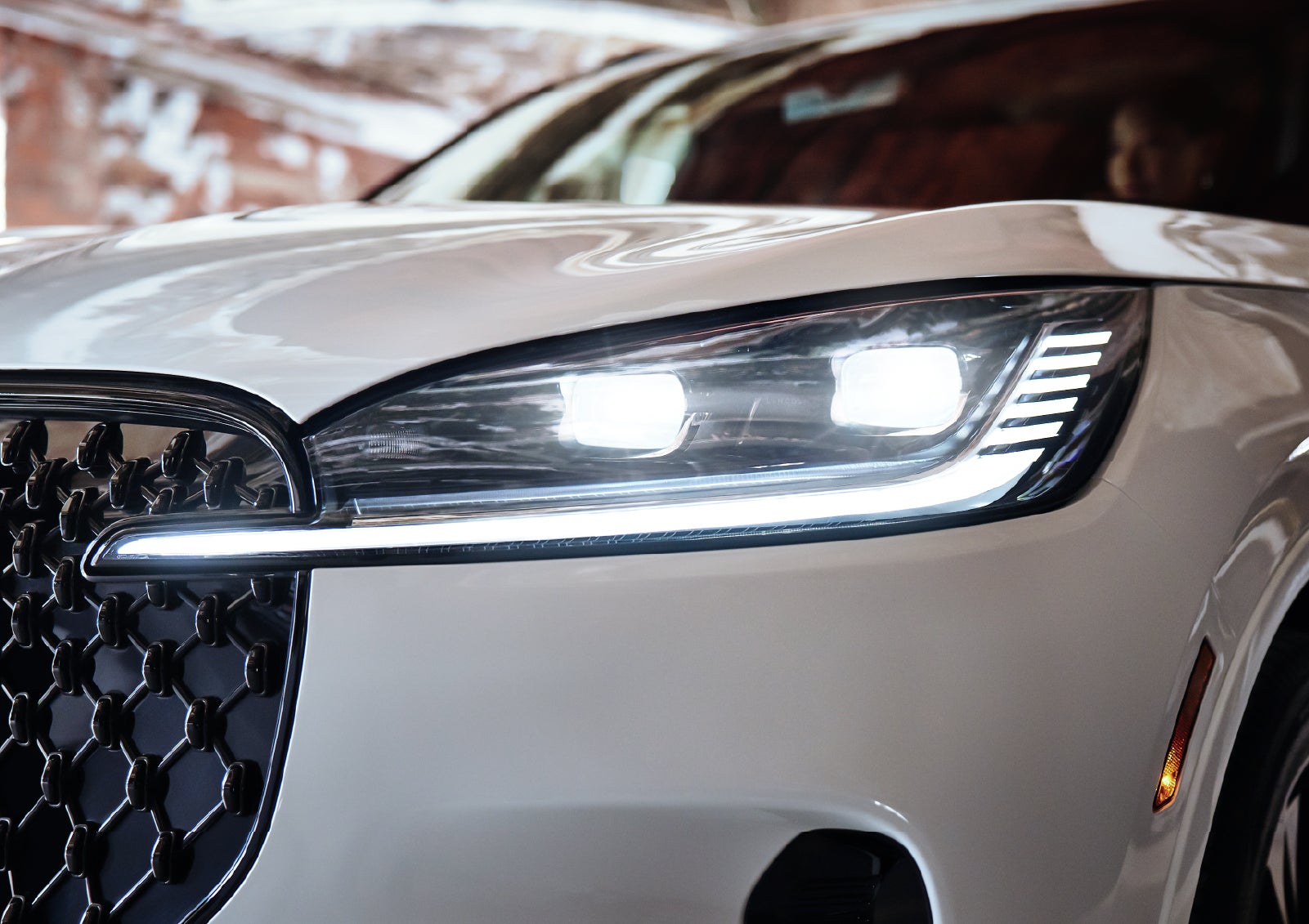 A close-up of a headlamp on the 2027 Lincoln Aviator® SUV is shown. | Bill Collins Lincoln of Louisville in Louisville KY