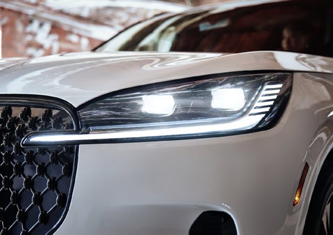 A close-up of a headlamp on the 2027 Lincoln Aviator® SUV is shown. | Bill Collins Lincoln of Louisville in Louisville KY